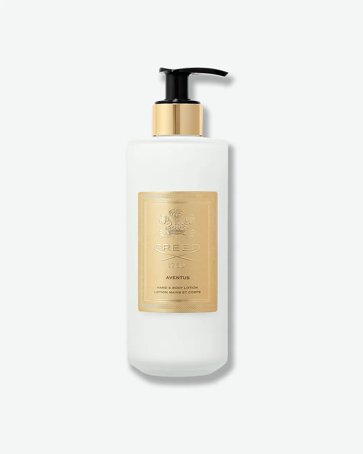 White Creed Aventus Hand & Body lotion bottle with black pump and gold label on a white background