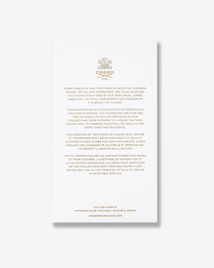 Back of Creed Green Irish Tweed packaging with detailed gold text on a white background