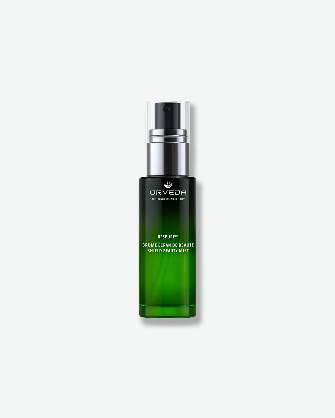 Green skincare bottle with silver cap on a white background