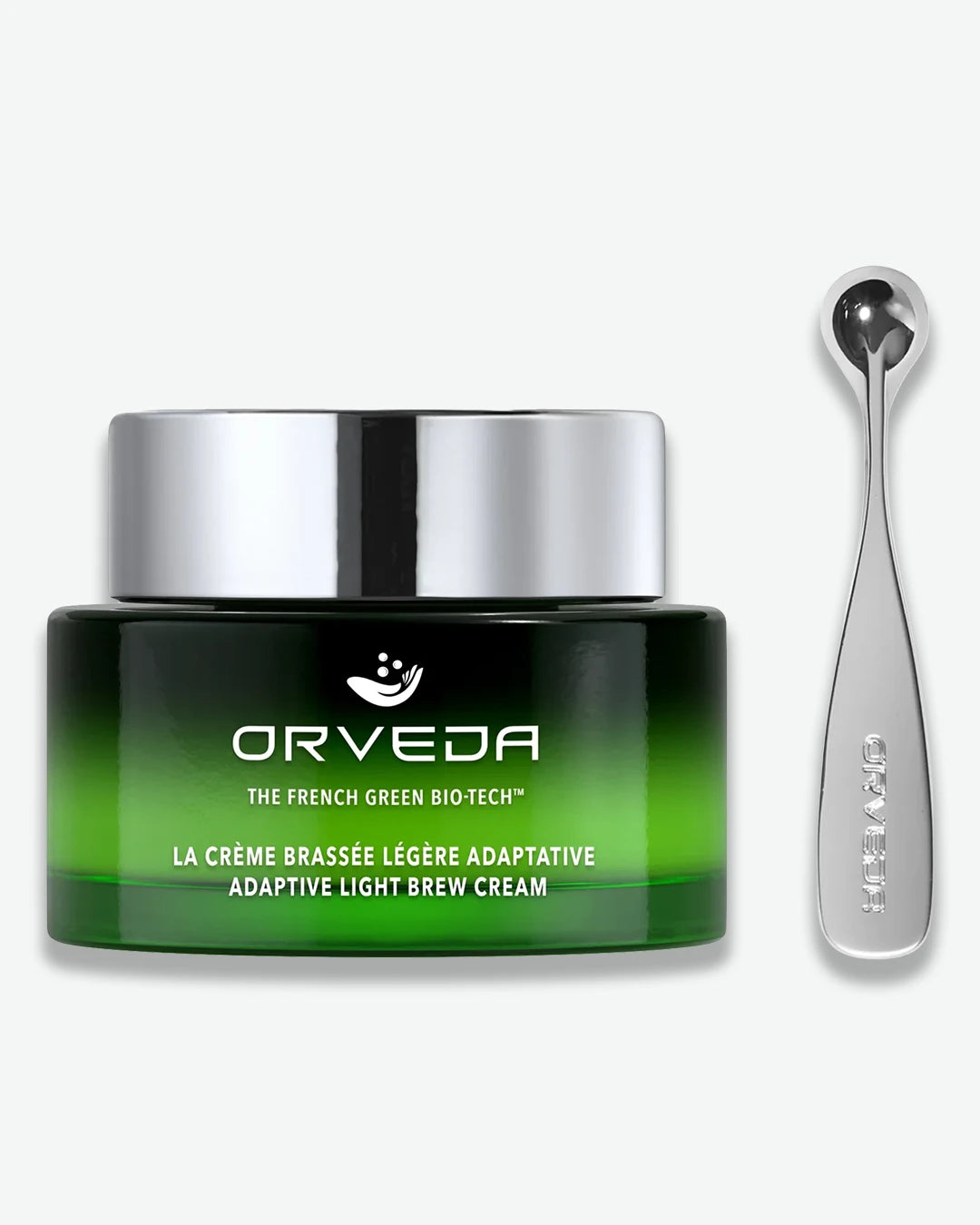 Orveda cream jar with a spoon on a white background