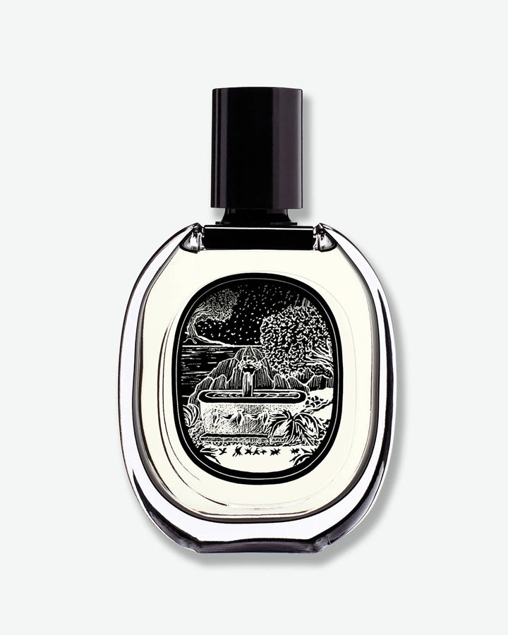 Perfume bottle with artistic design on a white background
