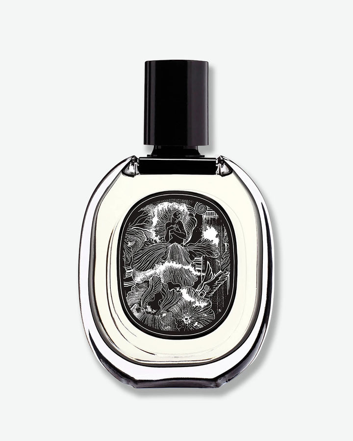 Perfume bottle with decorative label on a white background