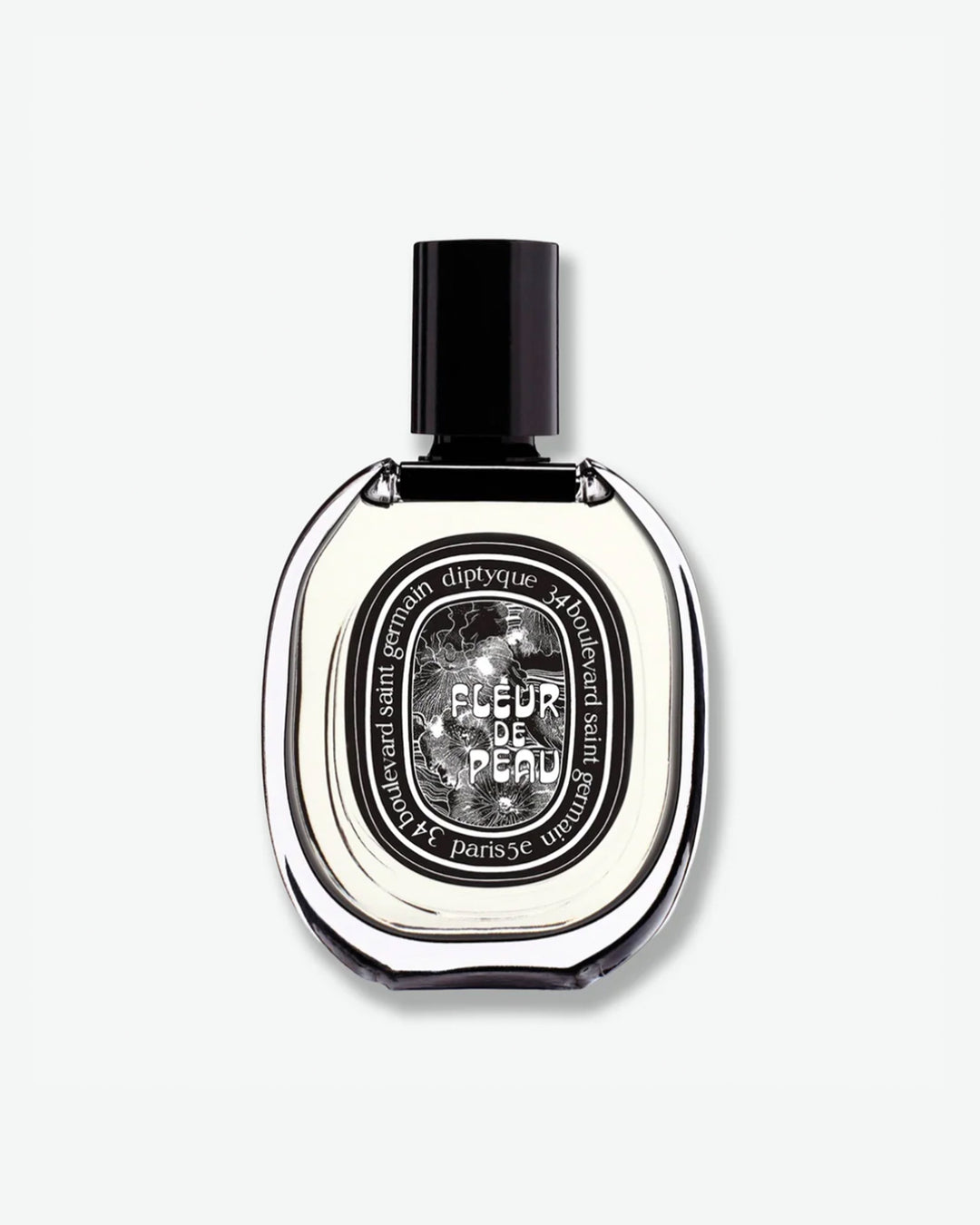 Diptyque Fleur de Peau Eau de Parfum in a signature oval clear glass bottle with a black cap and an intricate black and white illustrated label, isolated on a light grey background.