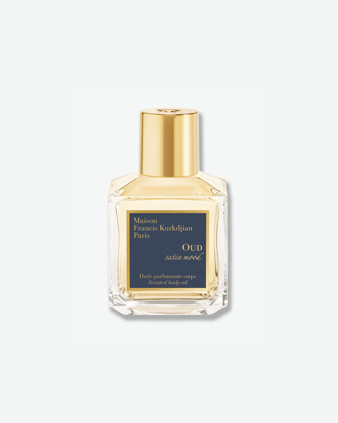 Front view of a square clear glass bottle with a gold cap containing Maison Francis Kurkdjian Paris "OUD satin mood" Scented body oil (Huile parfumante corps), featuring a dark blue and gold label.