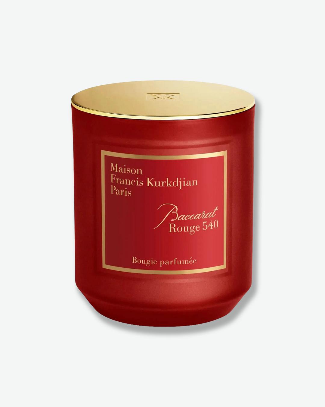 Red candle with gold lid featuring Maison Francis Kurkdjian branding on a white background
