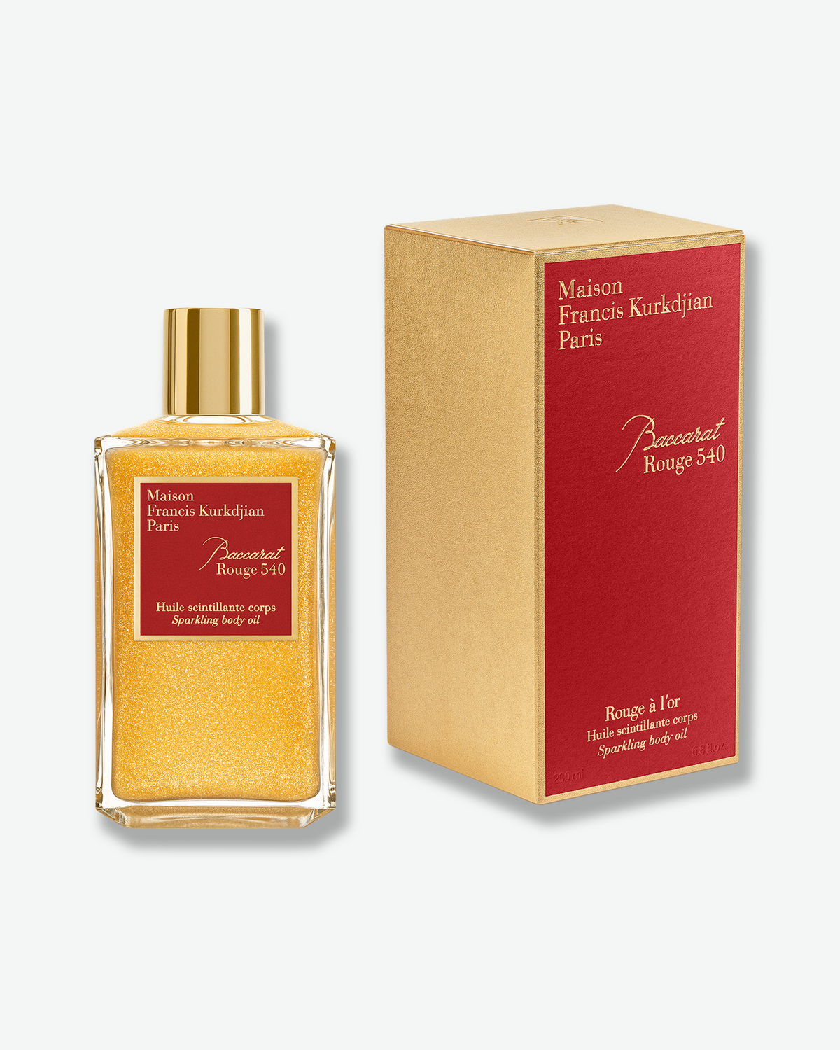 Baccarat Rouge 540 Sparkling Body Oil with its gold-and-red presentation box, showcasing the luxe holiday-ready packaging.