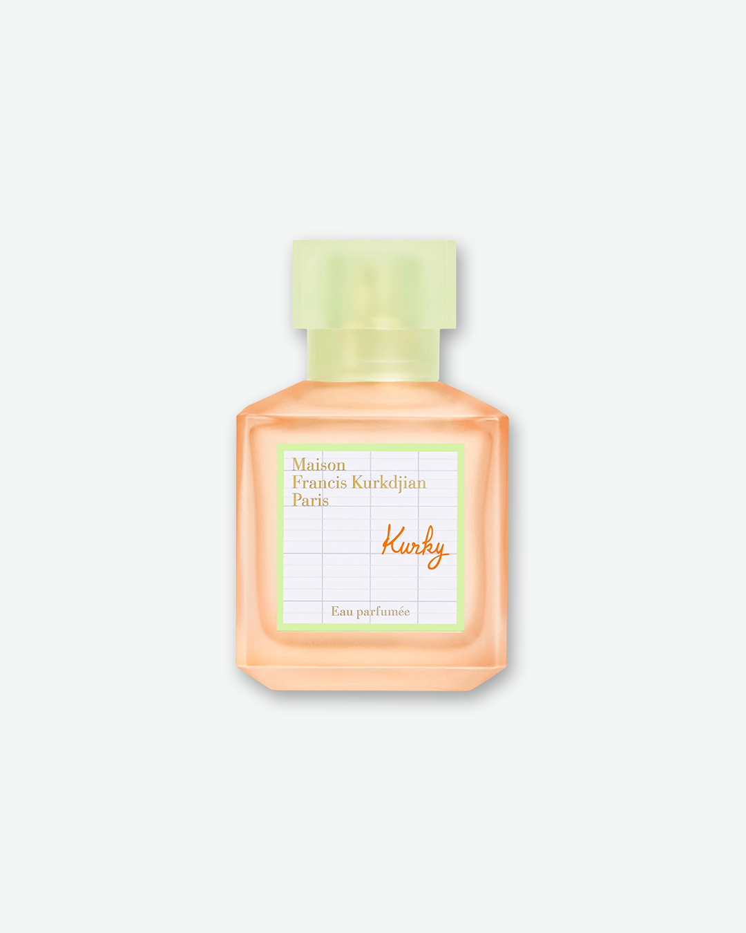 Front view of a Maison Francis Kurkdjian Paris "Kurky" Eau Parfumée bottle against a plain gray background. The square, semi-opaque pastel peach glass bottle features a frosted, lime green translucent cap and a white graph-lined label with a bright green border. The fragrance name "Kurky" is written in orange script.
