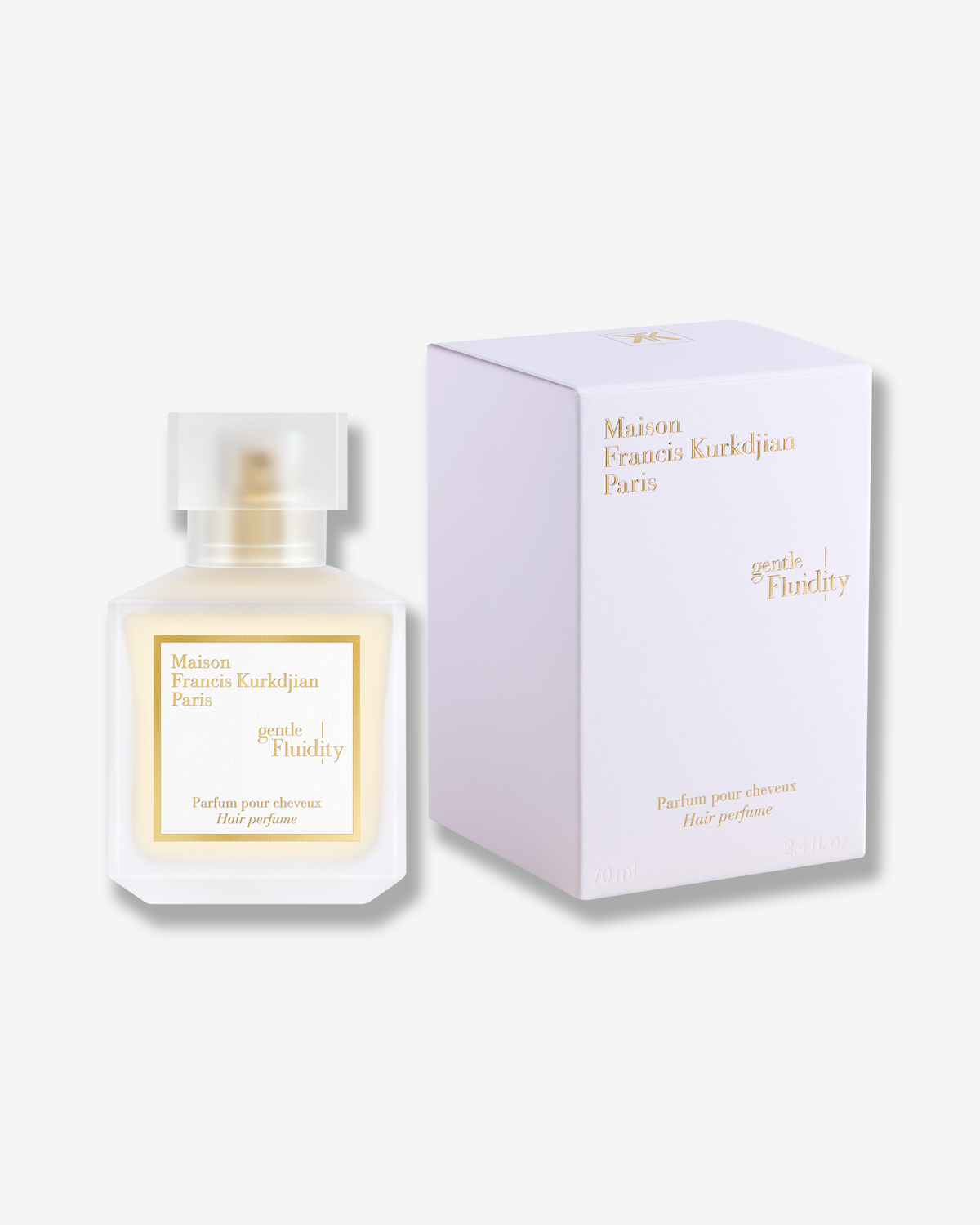 Maison Francis Kurkdjian Gentle Fluidity Hair Perfume displayed beside its coordinating white-and-gold box.