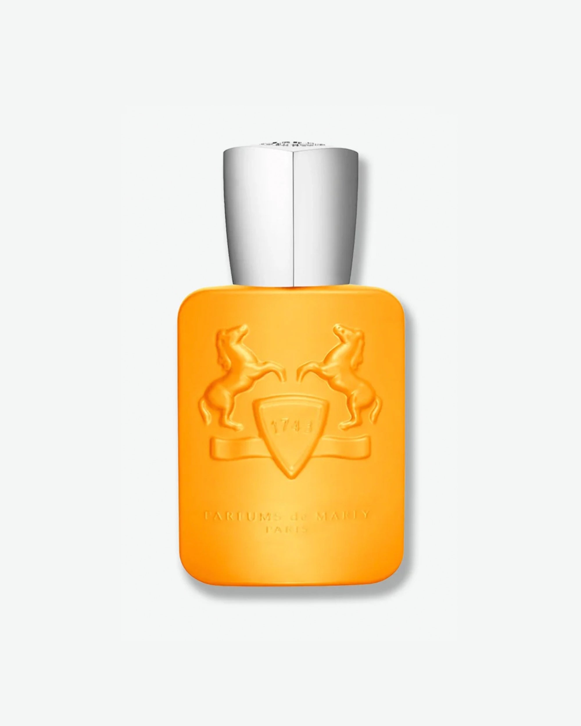 Orange perfume bottle with silver cap on a white background