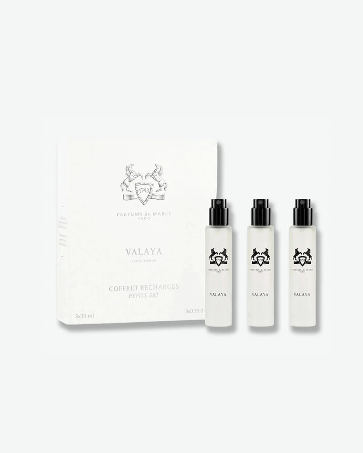 Valaya perfume set with three bottles and a box on a white background