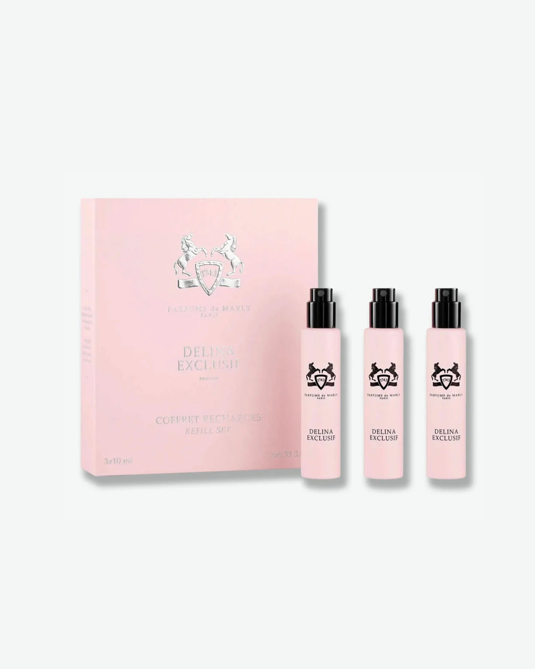 Pink Delina Exclusive set with three bottles and a box on a white background