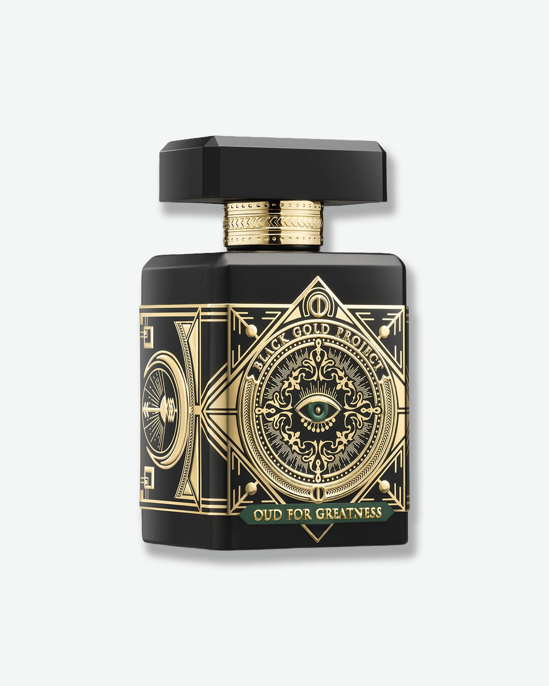 Black and gold perfume bottle with intricate design on a white background