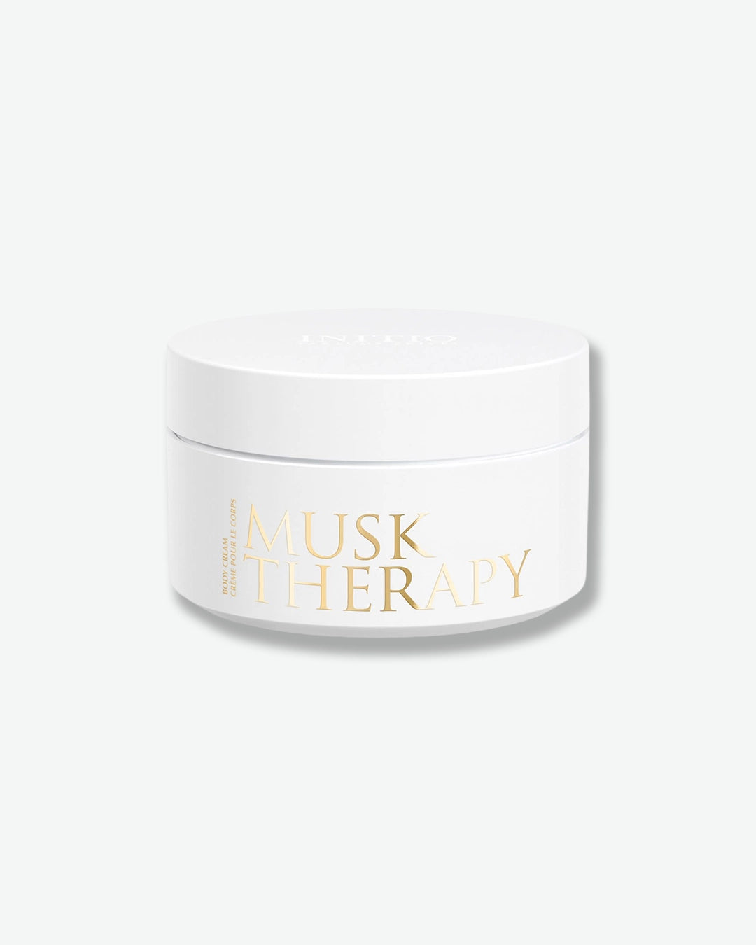 White jar with gold text on a white background