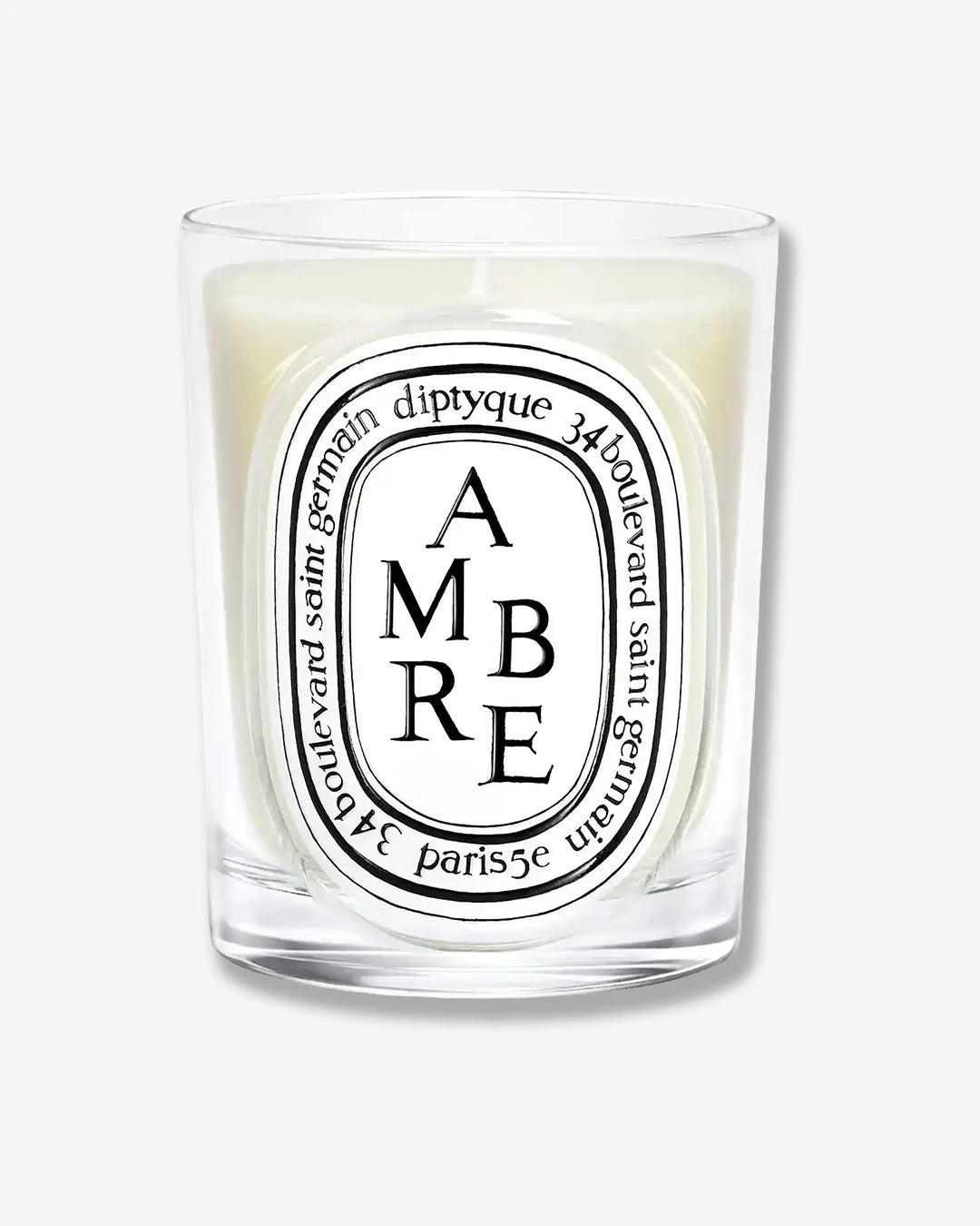 Diptyque Ambre candle on a white background