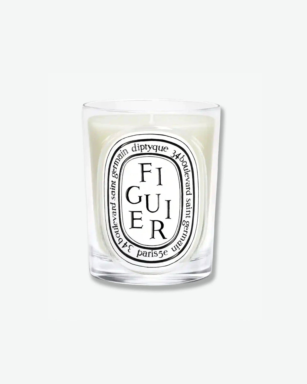 Diptyque Figuier scented candle in a classic clear glass jar featuring the signature white oval logo with black lettering, isolated on a light grey background.
