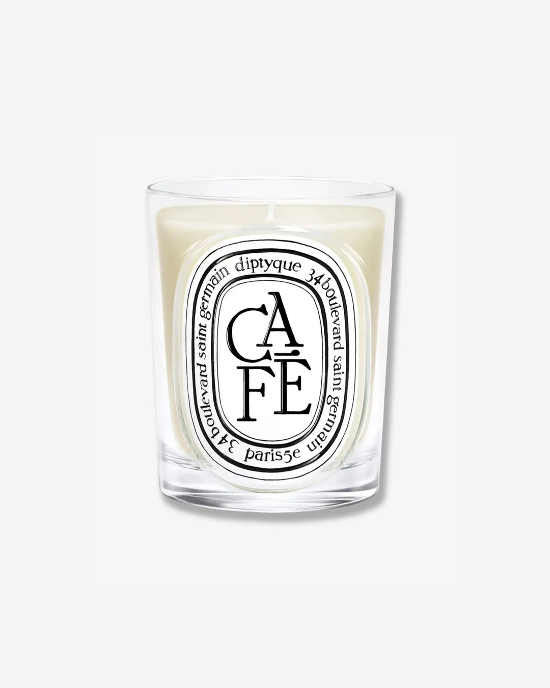 Diptyque Café scented candle in a classic clear glass jar featuring the signature white oval logo with black lettering, isolated on a light grey background.