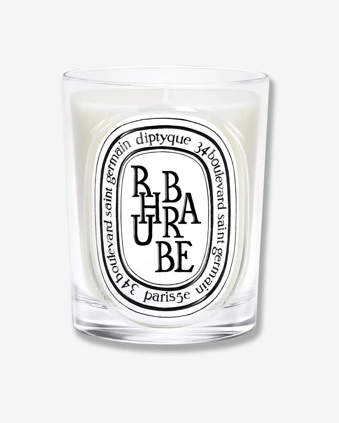 Diptyque candle with 'Rhubarbe' label on a white background