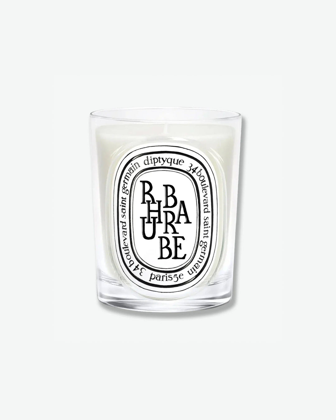 Diptyque Rhubarbe scented candle in a classic clear glass jar featuring the signature white oval logo with black lettering, isolated on a light grey background.