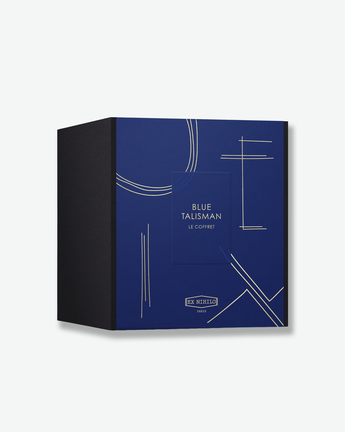 Ex Nihilo Blue Talisman Le Coffret set displayed with the gift box, full-size fragrance, travel spray and Blue Talisman hand cream.
