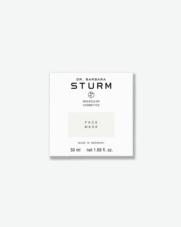 A product shot of the white square cardboard box for the Dr. Barbara Sturm Face Mask, centered against a light gray background. It features minimalist black text with a very light gray or off-white rectangle highlighting the product name "FACE MASK". The bottom notation details the volume as "50 ml net 1.69 fl. oz."