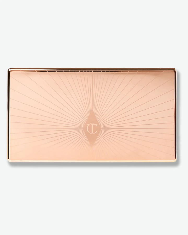 Closed view of bronzing and highlighting palette with branding on a white background