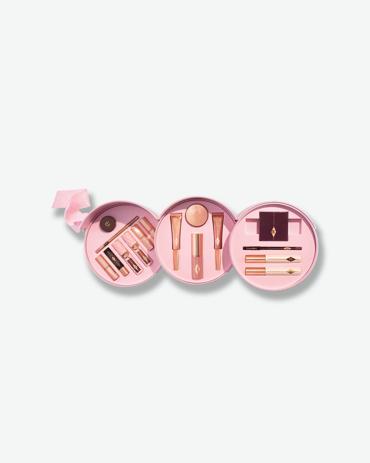 Open Charlotte Tilbury Pillow Talk Beauty Soulmates case displaying a full assortment of makeup products.