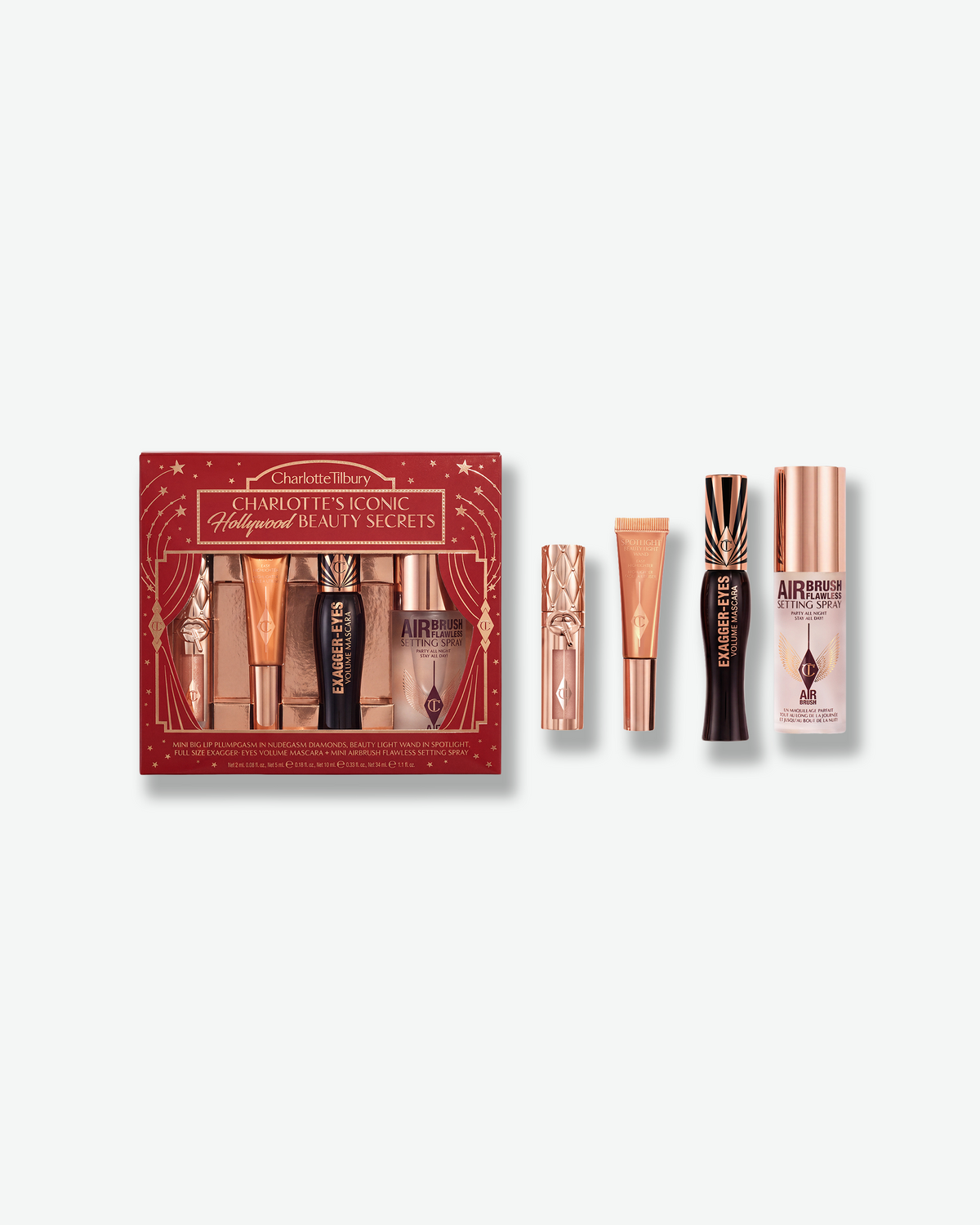 Charlotte Tilbury Charlotte’s Iconic Hollywood Beauty Secrets set featuring Mini Big Lip Plumpgasm, Beauty Light Wand, Exagger-Eyes Mascara, and Airbrush Flawless Setting Spray.