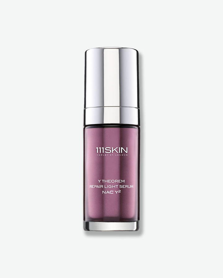 111SKIN repair light serum bottle on a white background