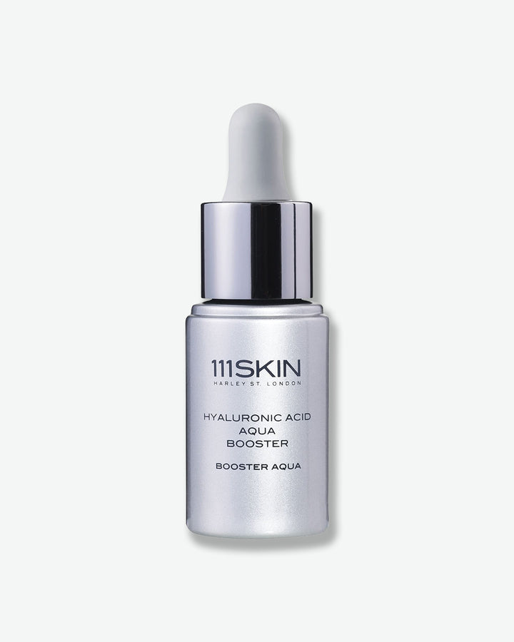 111SKIN serum bottle with dropper on a white background