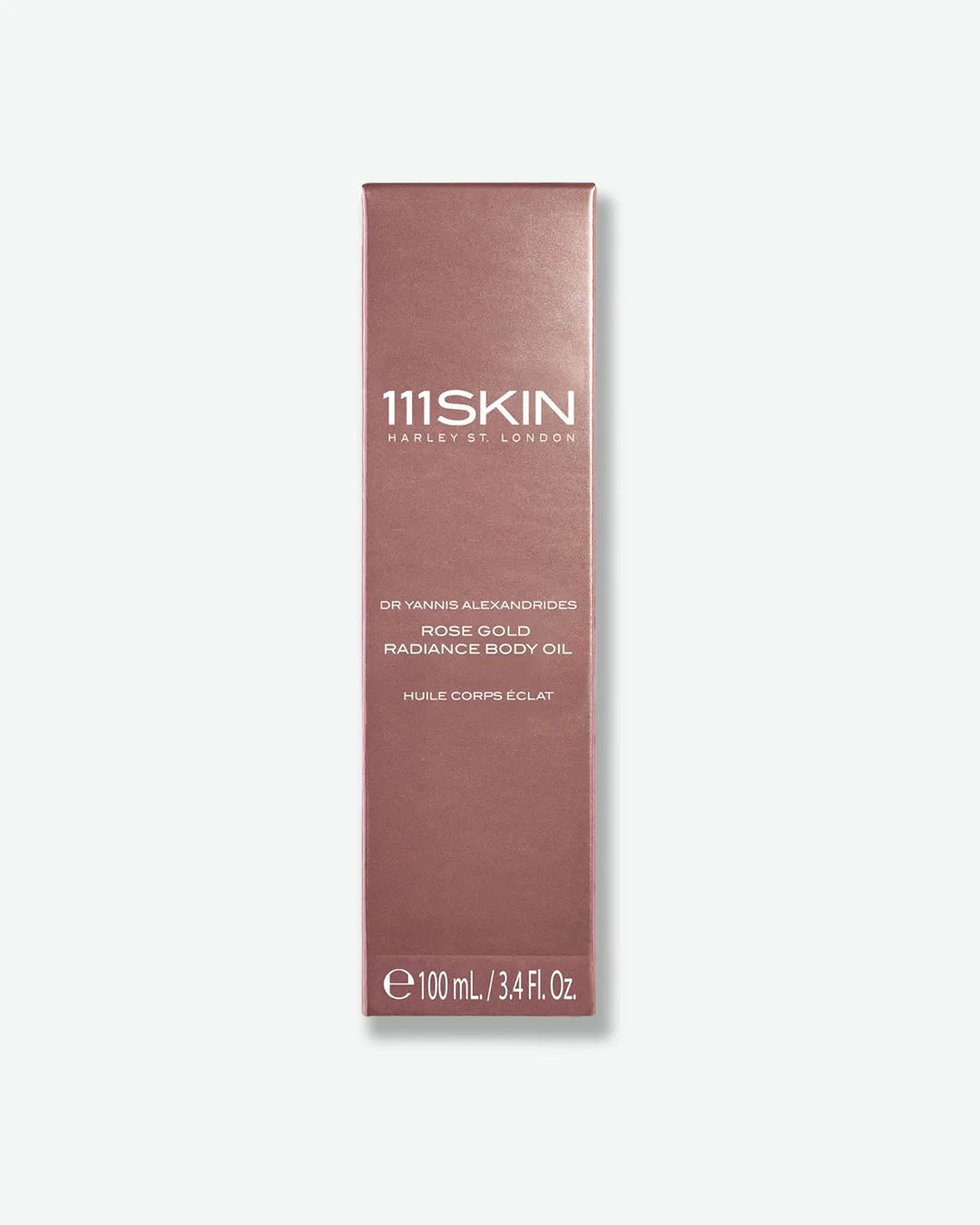 Metallic rose gold packaging box of 111SKIN rose gold radiance body oil on a white background