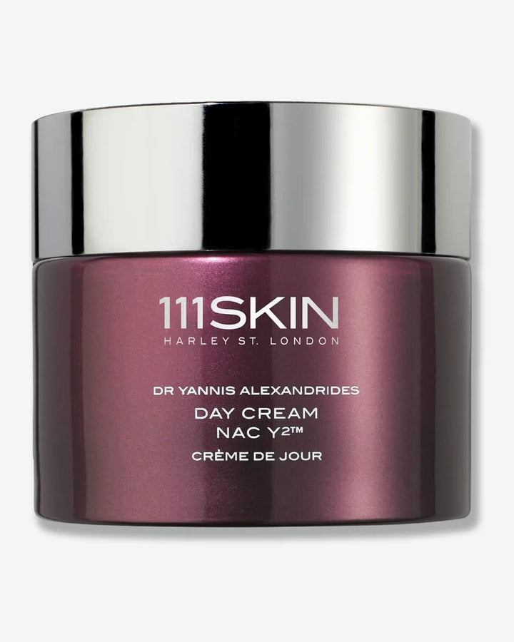 Metallic maroon jar of 111SKIN day cream nacy2 with silver lid on a white background