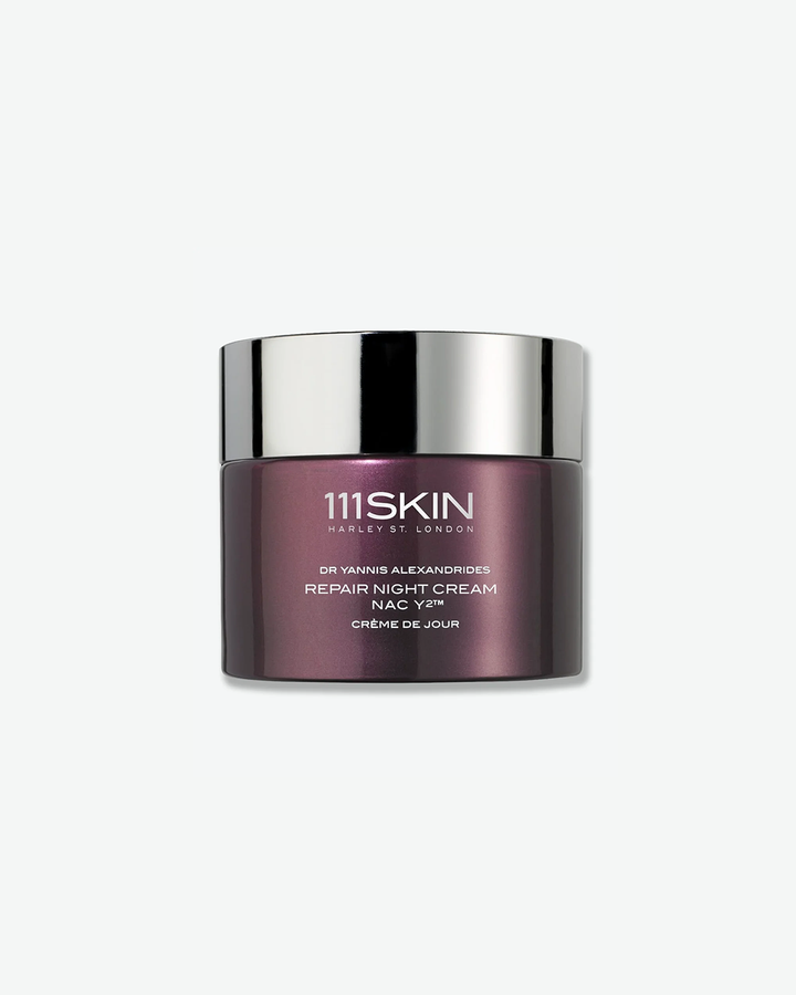 Metallic maroon jar of 111SKIN repair night cream with a silver lid on a white background
