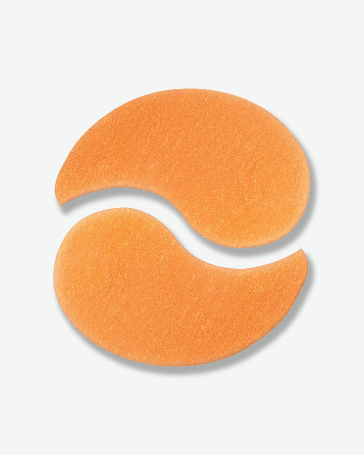 Orange eye masks on a light gray background