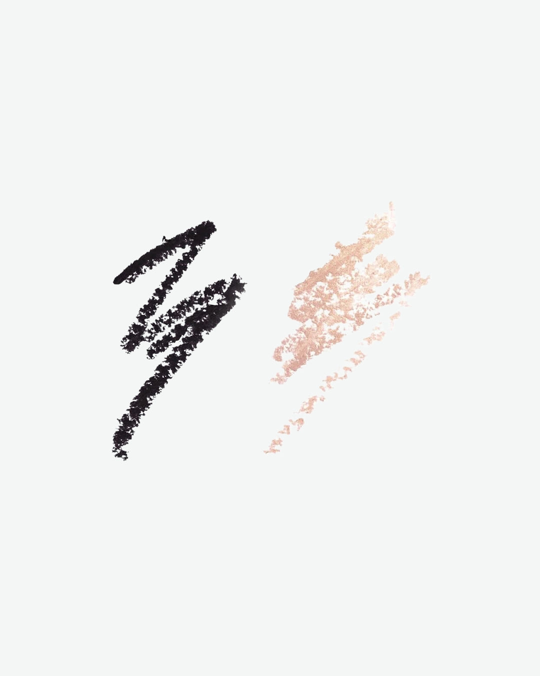 Textured makeup swatches showing a jagged, matte black eyeliner stroke on the left and a shimmering, champagne rose gold metallic stroke on the right against a plain white canvas.
