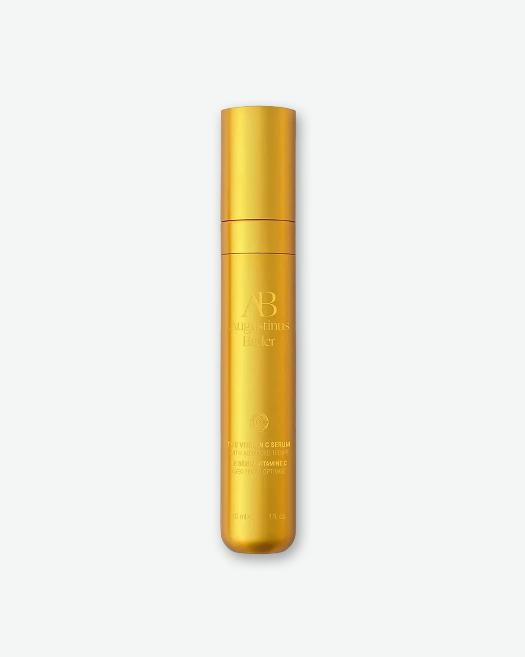 Augustinus Bader The Vitamin C Serum with Advanced TFC8 in a sleek 30ml (1 fl. oz.) metallic satin-gold cylindrical bottle.