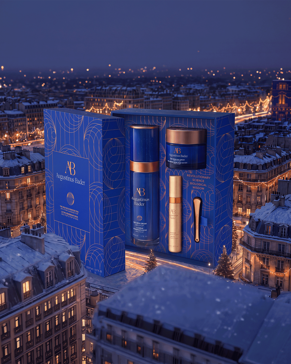 Augustinus Bader The Rich Rejuvenation Trio displayed against a snowy, illuminated cityscape at night.