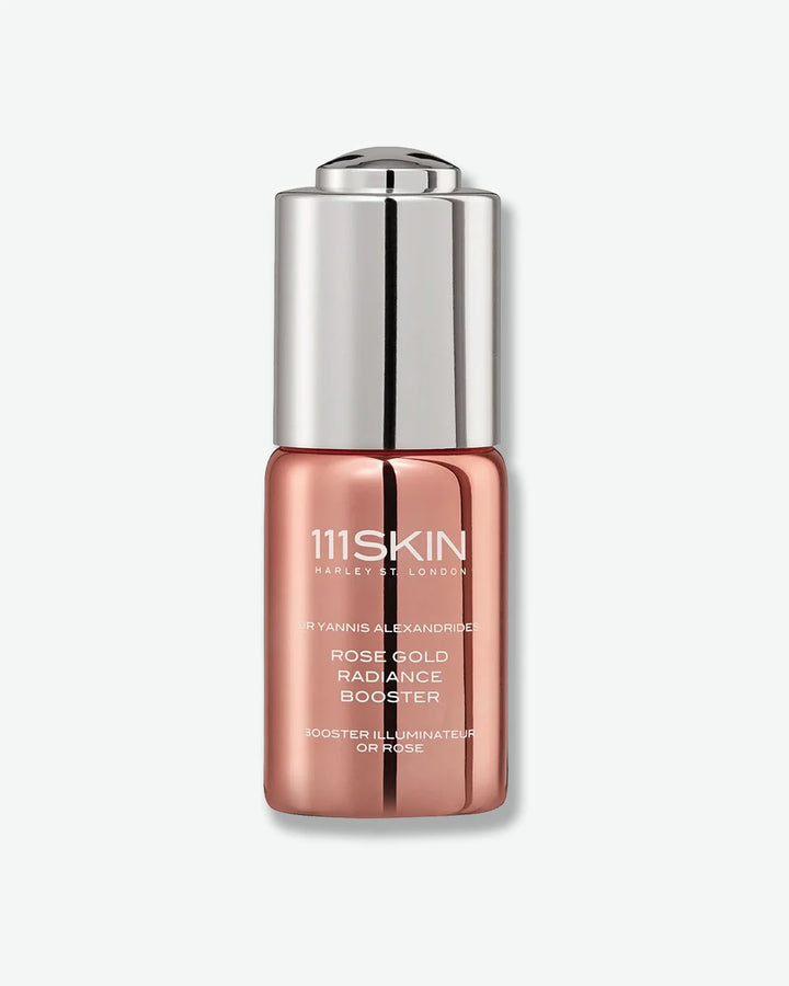 Rose gold bottle of 111Skin rose gold radiance Booster with silver cap on a white background