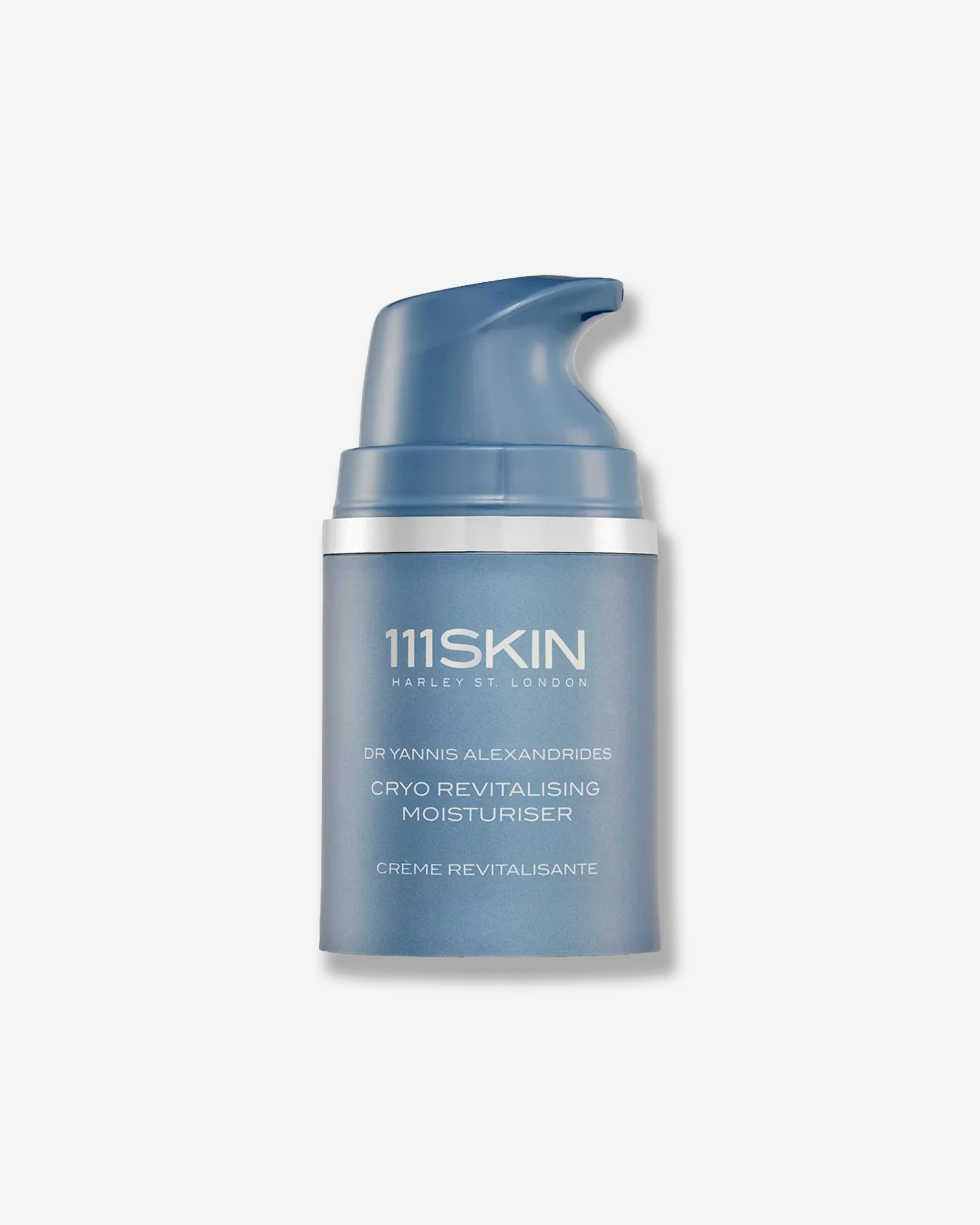 Front view of the 111SKIN Cryo Revitalising Moisturiser bottle shown with its silver over-cap removed. The matte steel-blue container is topped with a silver metallic accent ring and an integrated, curved pump dispenser mechanism finished in a matching steel-blue color.