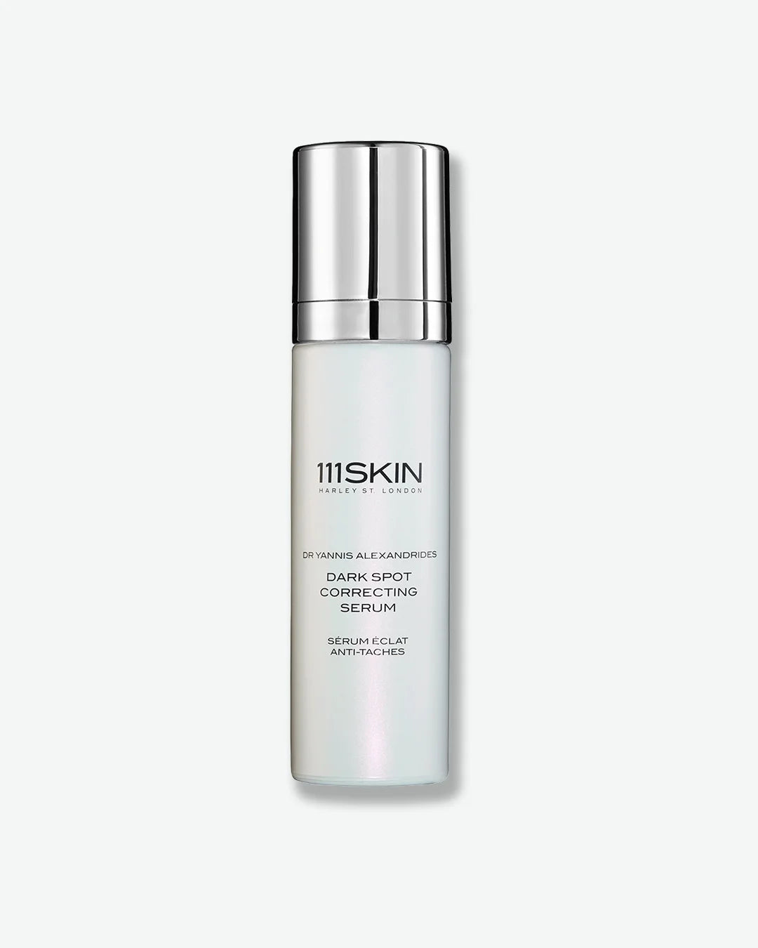 Pearlescant bottle of 111SKIN Dark Spot Correcting Serum bottle with a silver cap on a white background