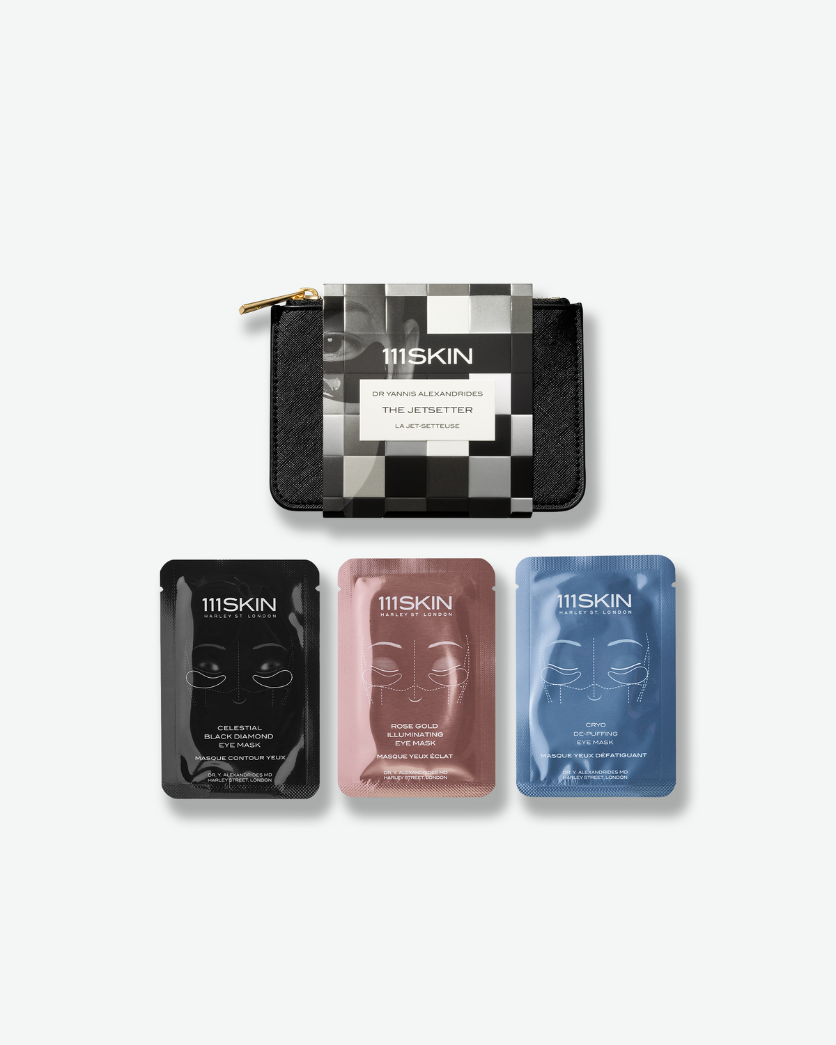 111SKIN The Jetsetter set featuring Black Diamond, Rose Gold, and Cryo De-Puffing eye masks with a black travel pouch.