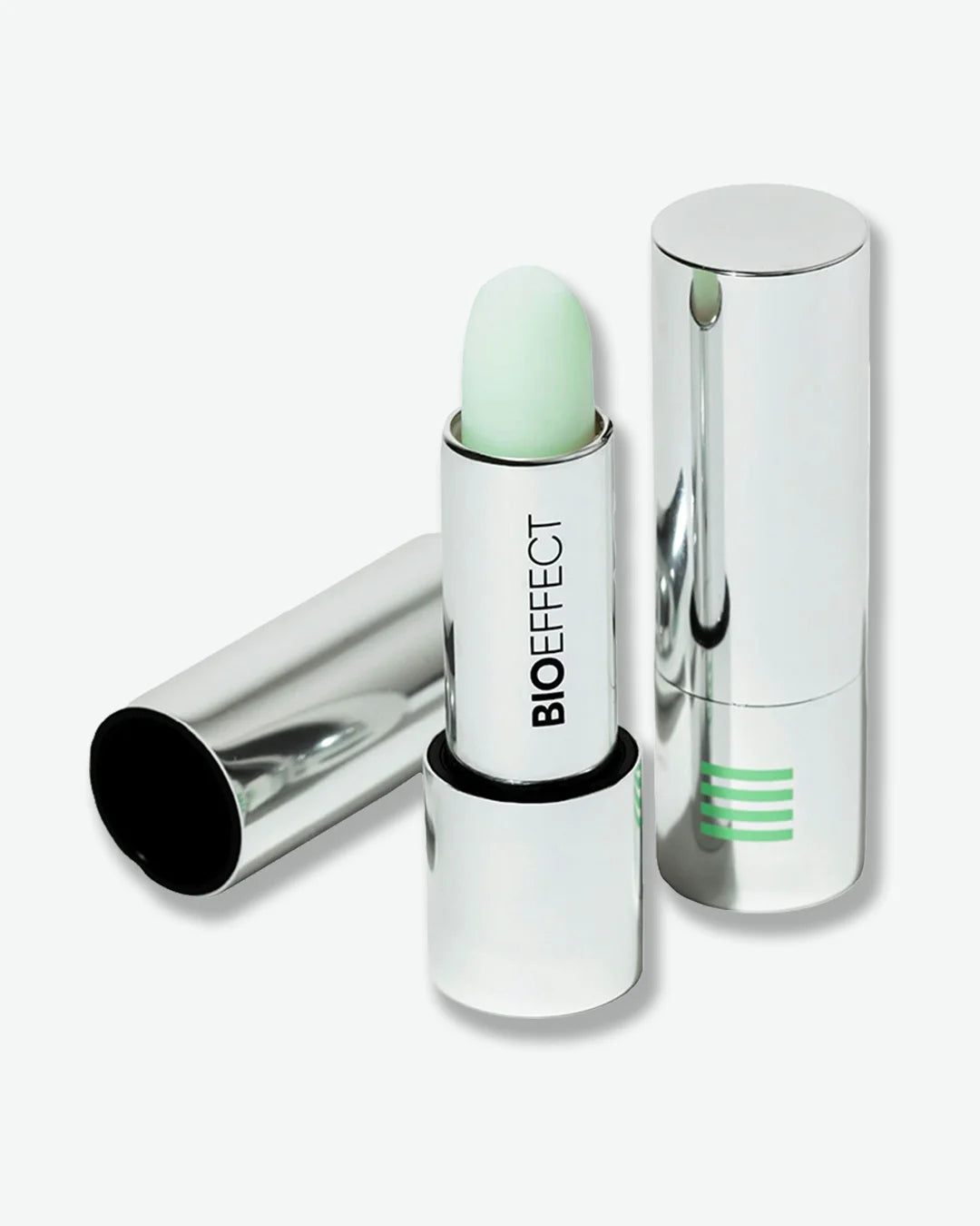 Mint green lip treatment with silver case on a white background, featuring the Bioeffect brand.
