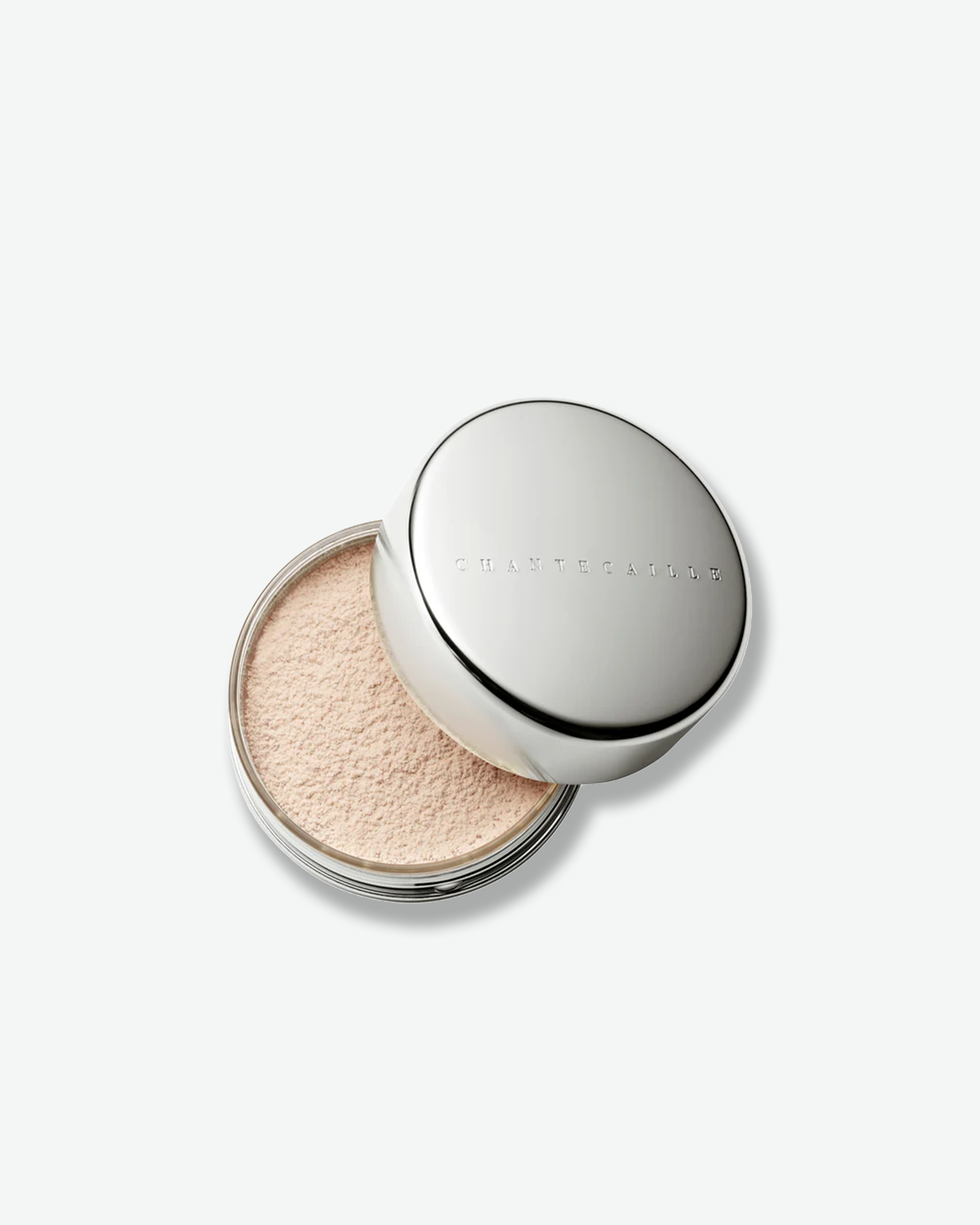 Makeup compact with powder on a white background