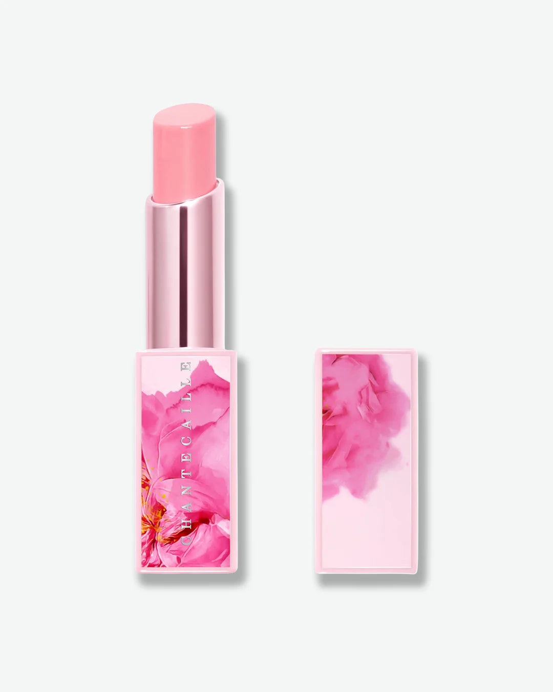 Pink lipstick with floral design on a white background