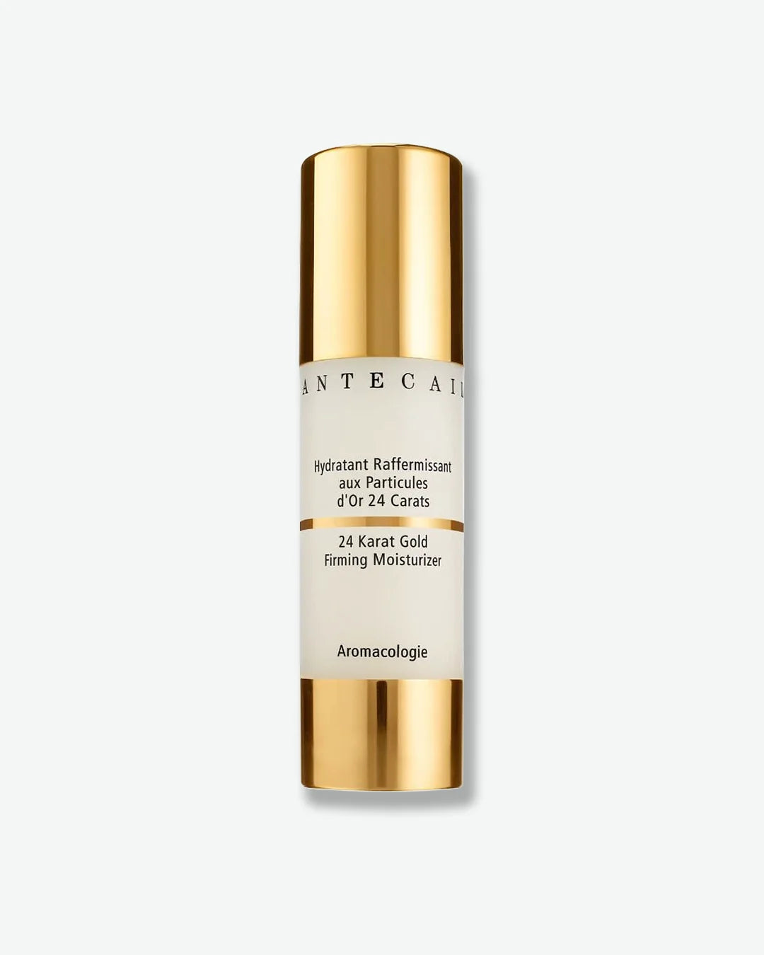 Gold skincare bottle with white label on a light gray background