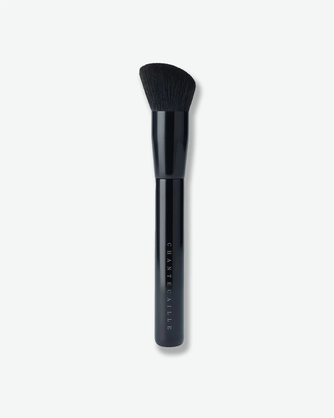 Black makeup brush with 'Chantecaille' branding on a white background