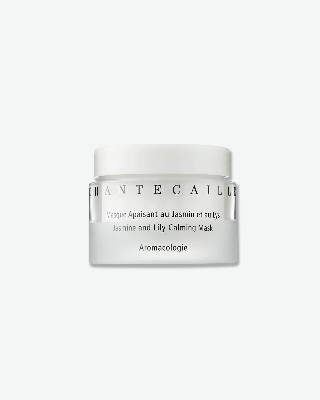 Chantecaille Jasmine and Lily Calming Mask in a clear glass skincare jar with a white screw-top lid.