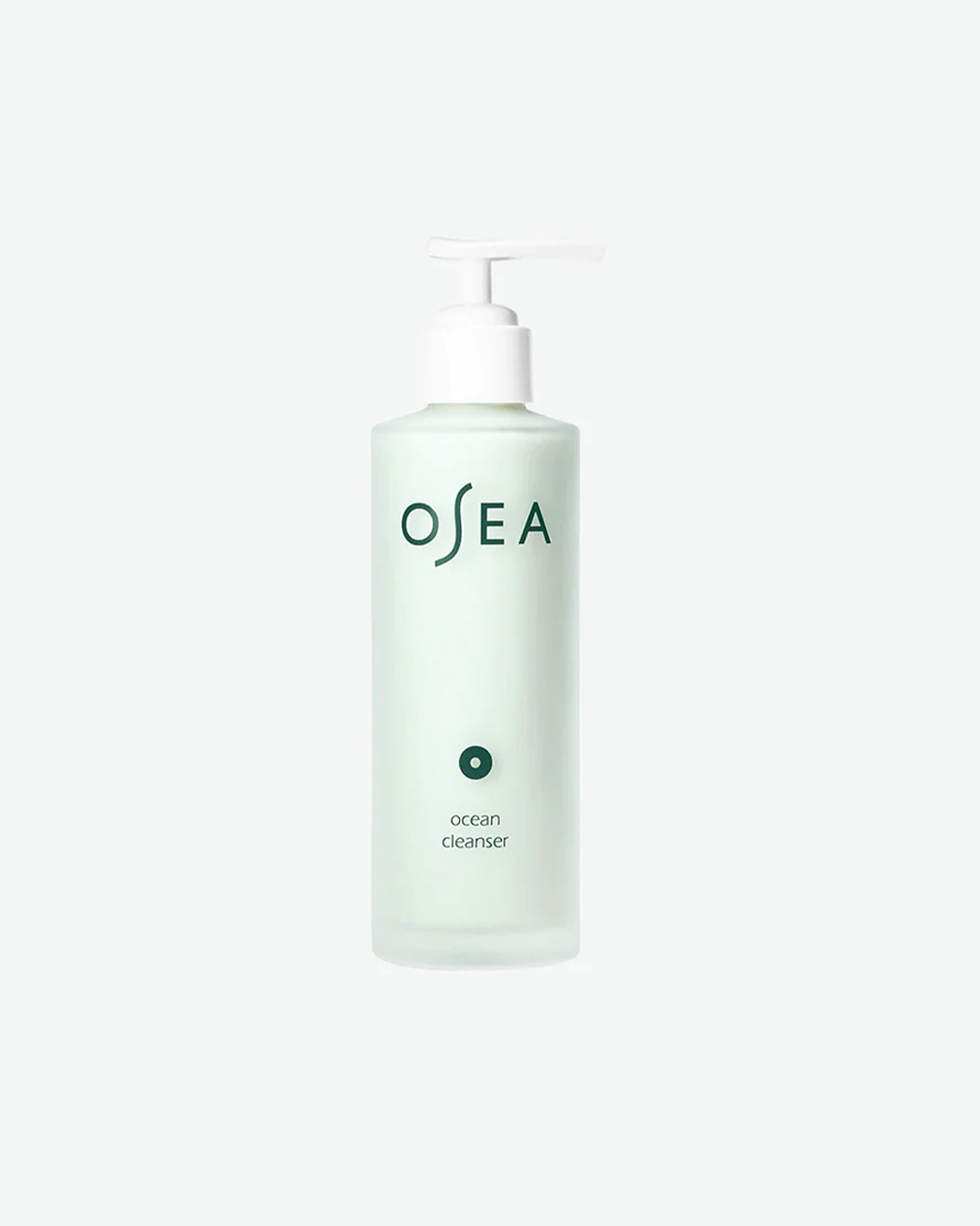 A vertical product shot of OSEA Ocean Cleanser. The light seafoam-green gel formula is visible through a frosted glass pump bottle, labeled with the dark green OSEA brand logo and an open circular ring graphic above the product name.