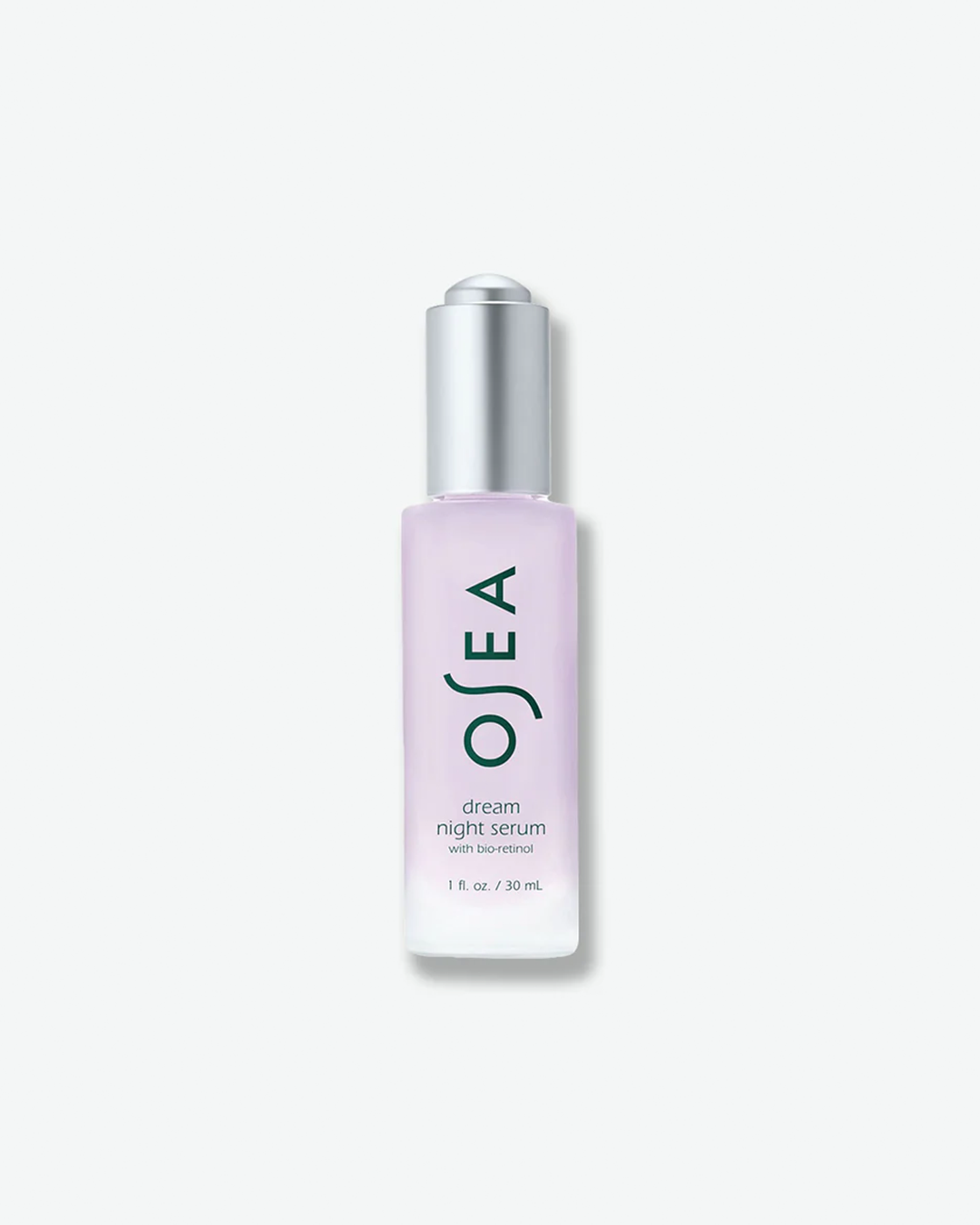 A vertical product shot of OSEA Dream Night Serum with Bio-Retinol in a 1 fl. oz. (30 ml) bottle. The milky, light lavender-colored formula is visible inside a frosted glass bottle featuring a sleek, metallic silver dropper cap and dark green branding.