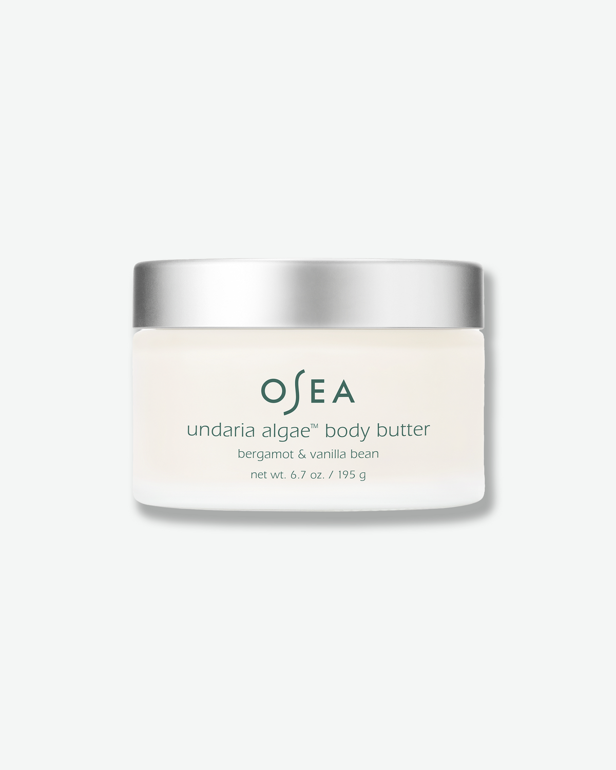 OSEA Undaria Algae Body Butter in Bergamot & Vanilla Bean, shown in its frosted jar with silver lid.