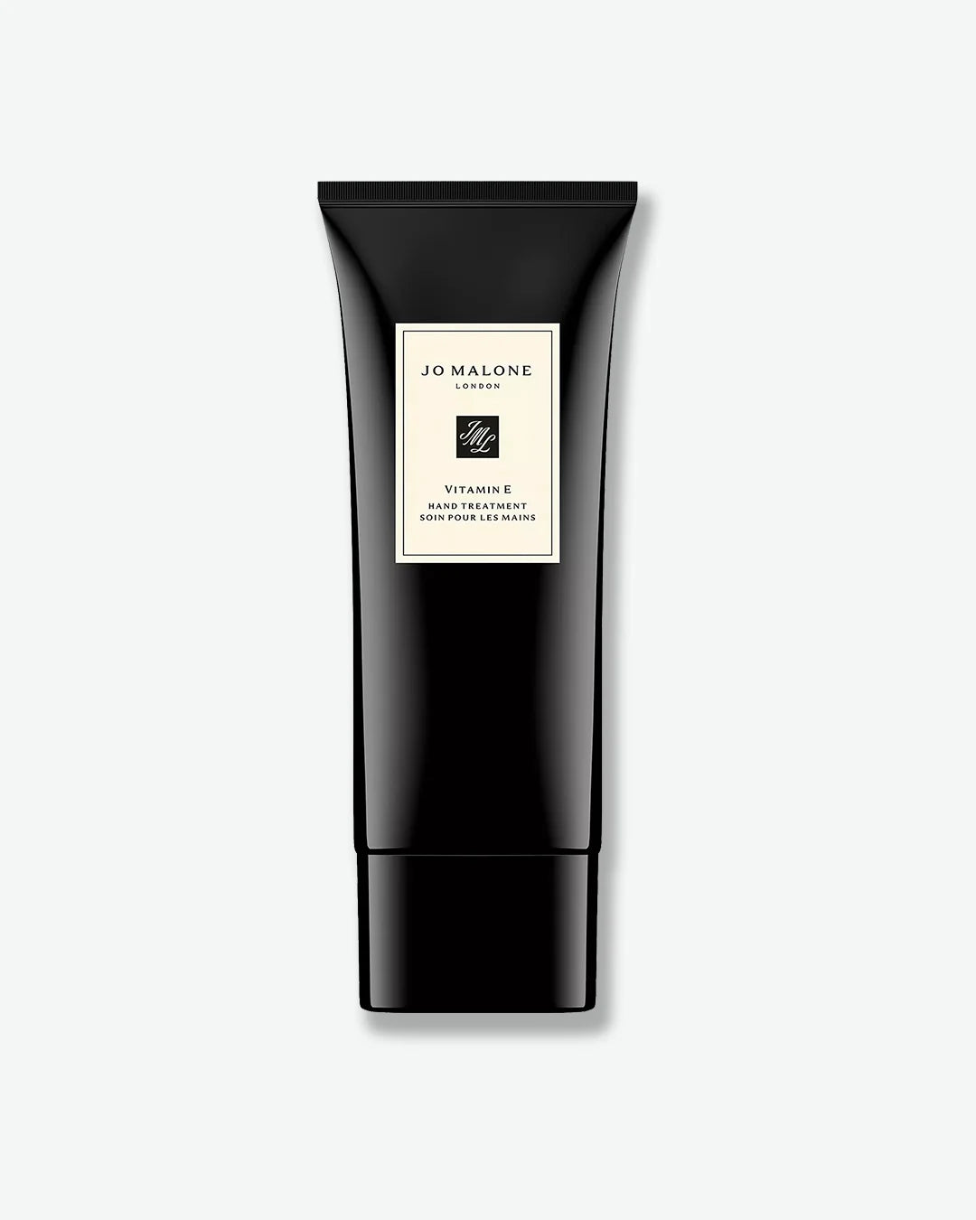 Black tube of Jo Malone hand cream on a white background